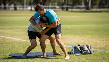 BJJ athletes training outdoors in UPF 50 rashguards