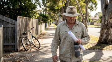 Worker in UPF clothing walking outdoors
