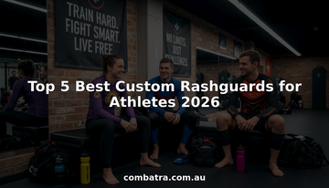 Athletes relaxing in custom rashguards at gym