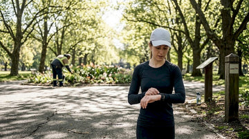 Runner training in UV protective clothing outside