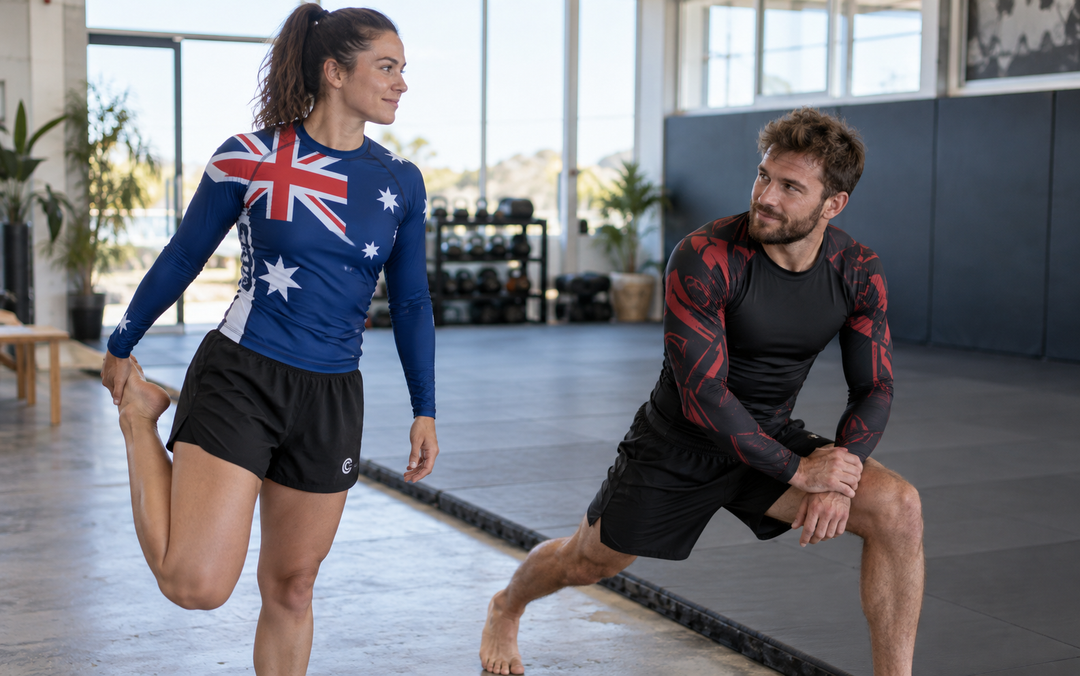 Australian no-Gi athletes comparing two different Combatra rashguard and shorts outfits in a realistic spring gym